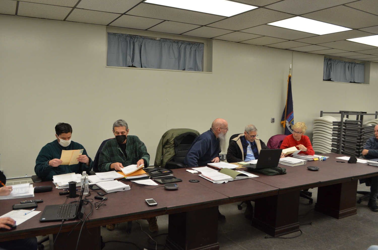 The members of Tusten's Zoning Board of Appeals deliberating at its February 14 meeting.